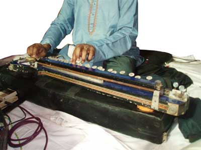 playing the bulbul tarang