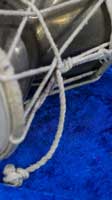 Damaru lacing