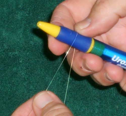 Mounting a esraj string (step 2)