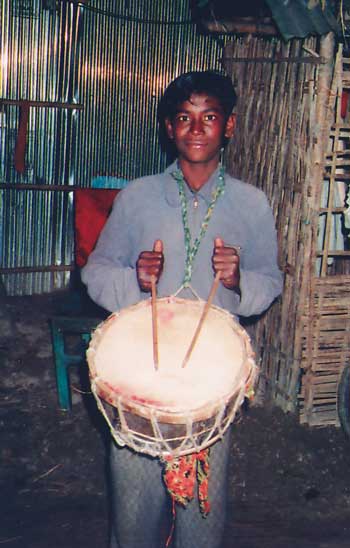 The jhorka and the korka are played with two sticks while be­ing hung from the neck