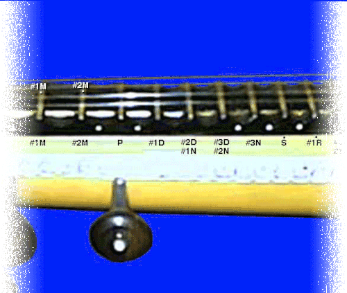 saraswati vina's frets in the mid­dle registers