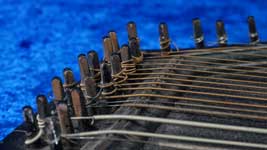 Surmandal tuning pegs