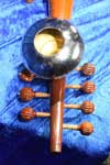 Tuning pegs and bell